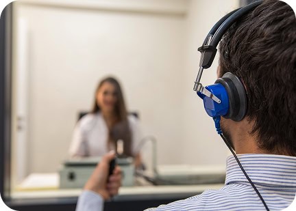 Audiology hearing test with professional equipment at LATUS Group clinic.