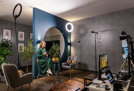 Professional woman in a modern office discussing neurodiversity certification.