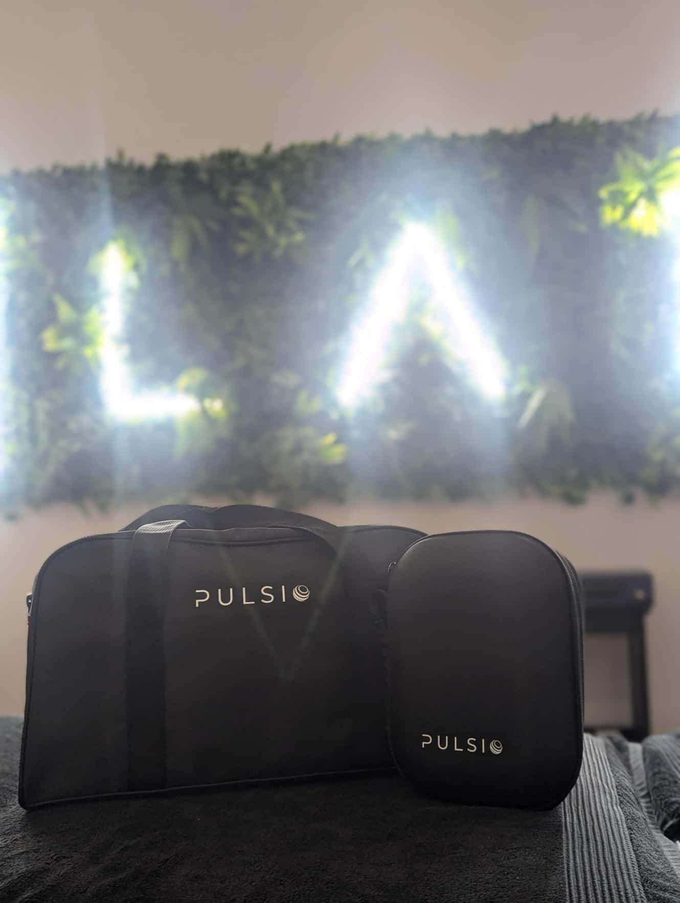 LATUS Group logo with Pulsio medical device in clinic setting.