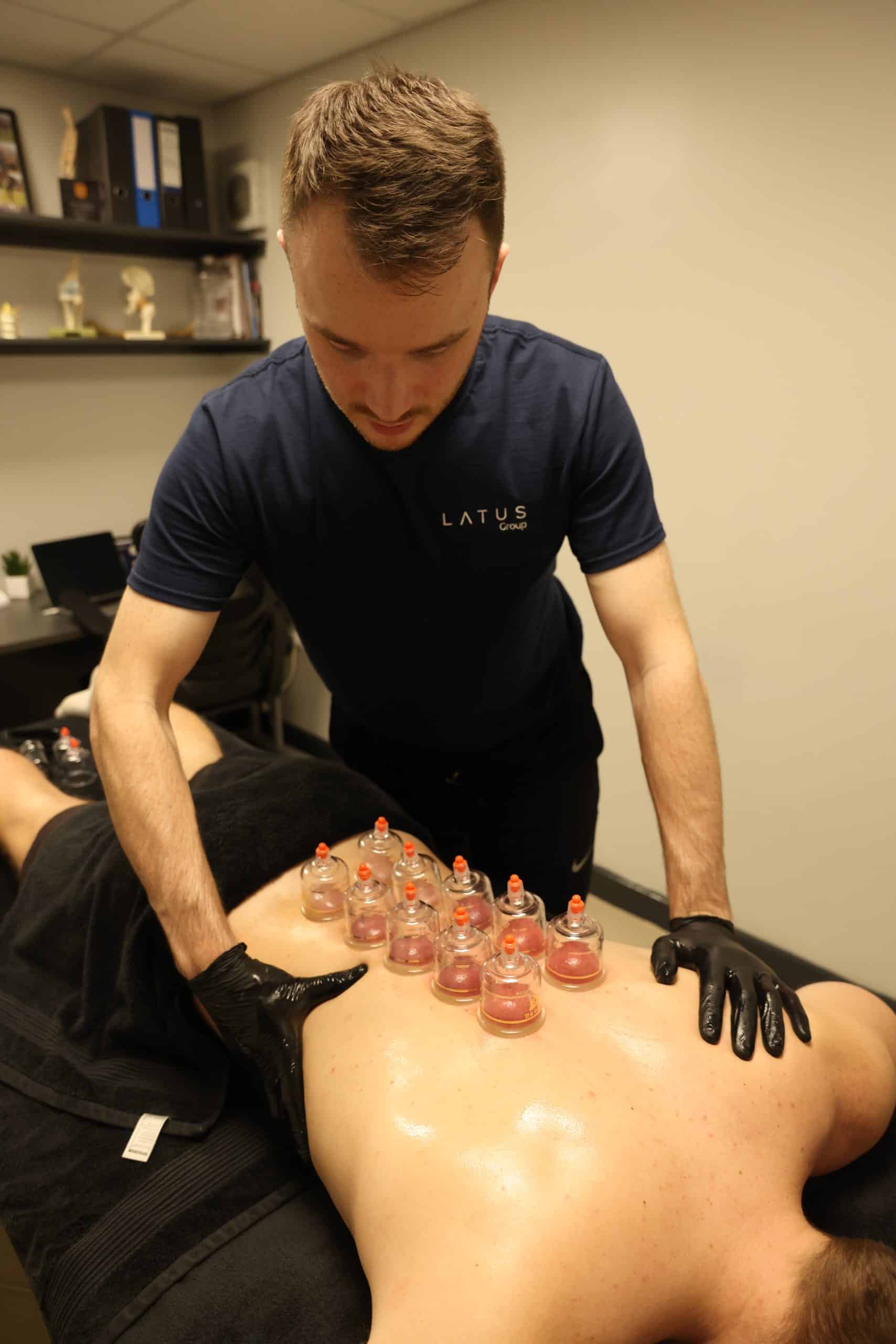 Cupping therapy session at LATUS Injury Clinic for pain relief and muscle recovery.