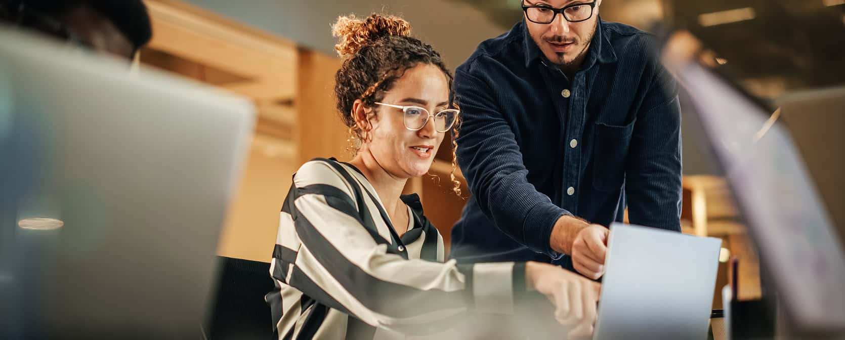 Team collaboration in a professional office environment.