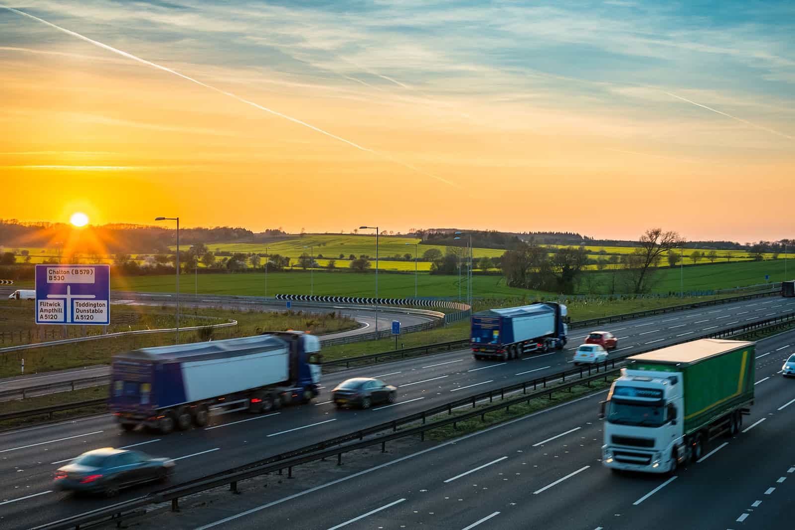 Noise survey assessment of busy UK motorway traffic at sunset.