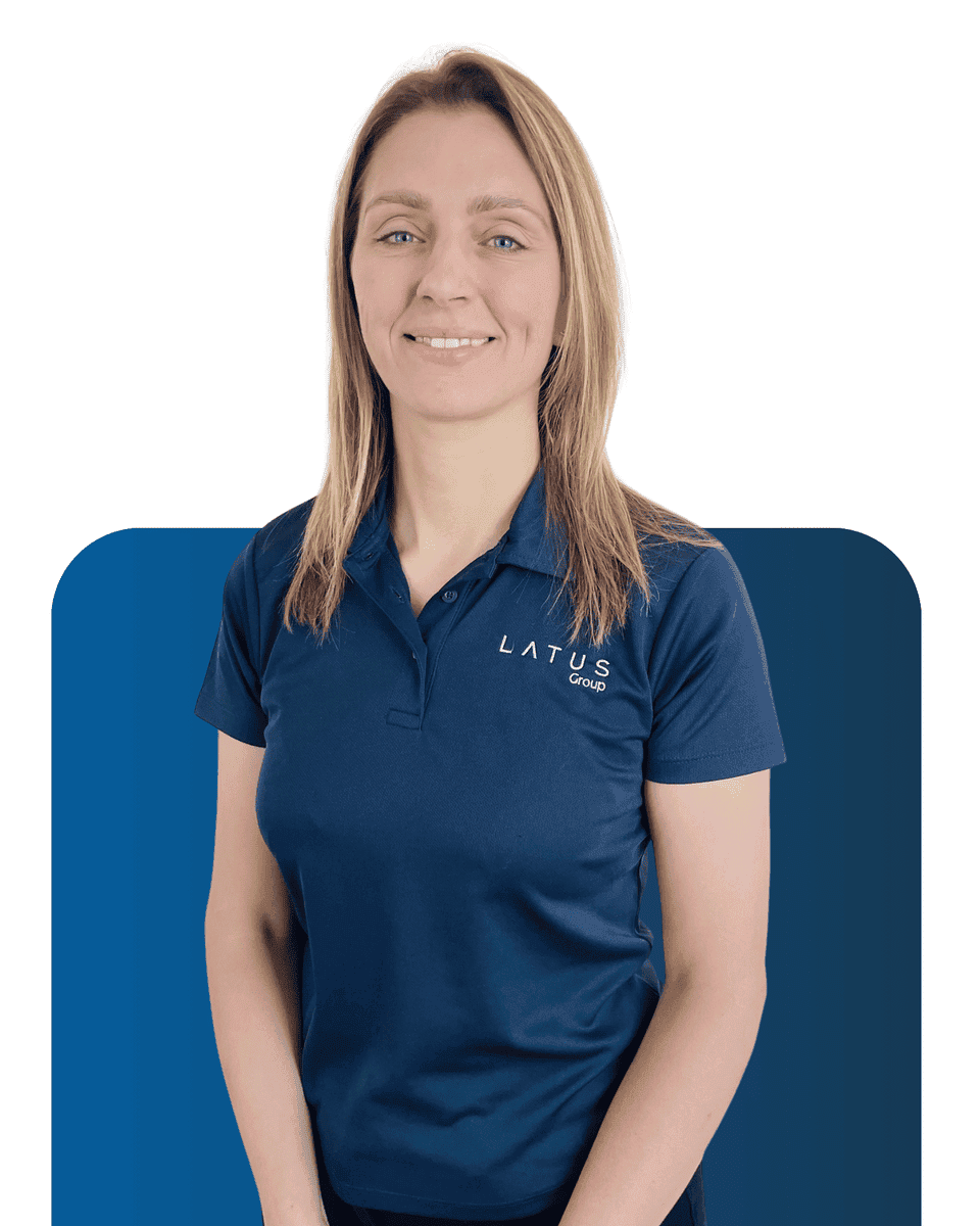 Professional woman in LATUS Group uniform for Meet the Team page.