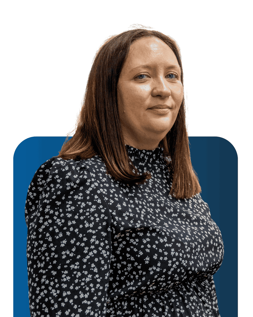 Professional woman representing LATUS Group team members in a corporate setting.