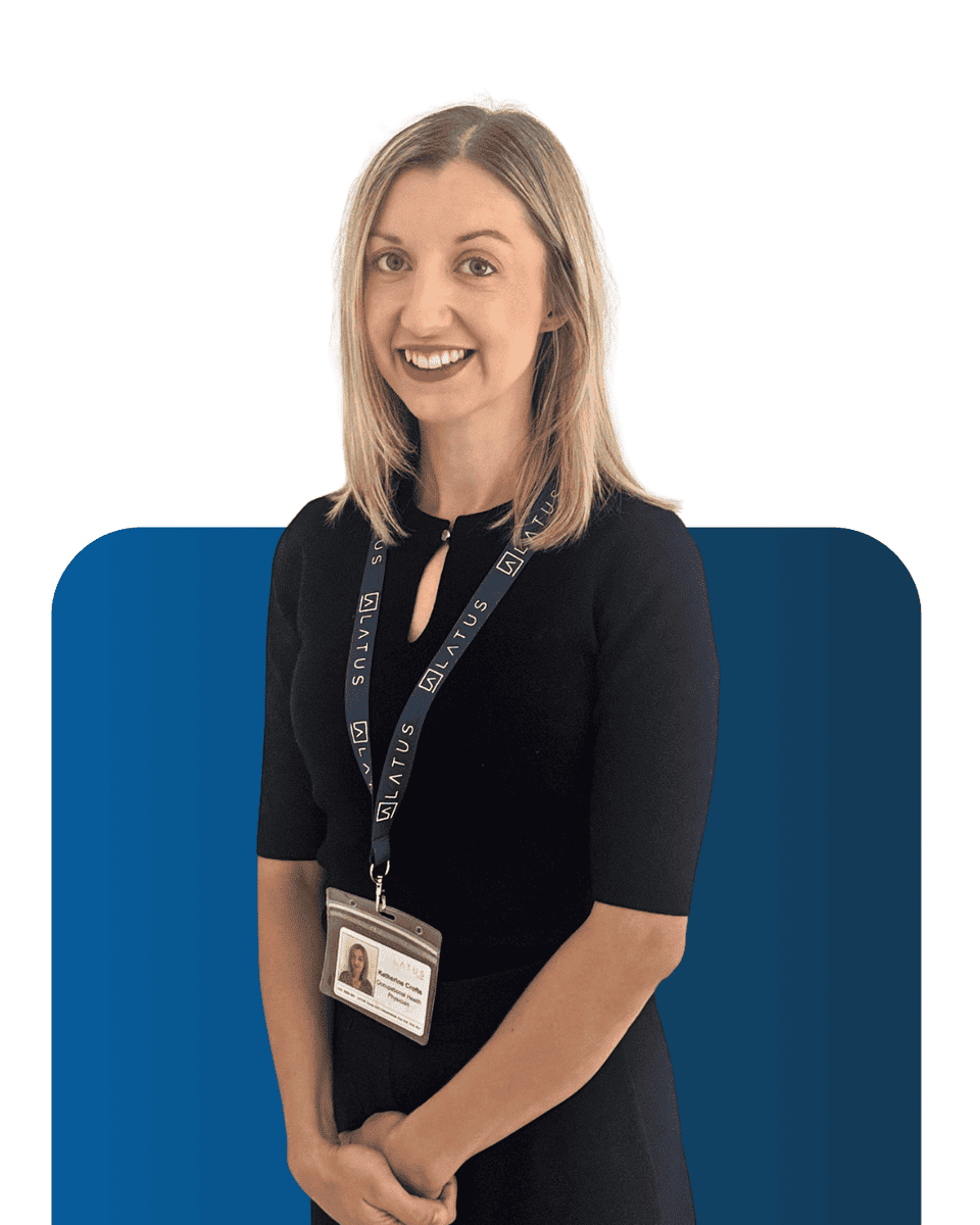 Professional team member at LATUS Group, smiling in business attire.