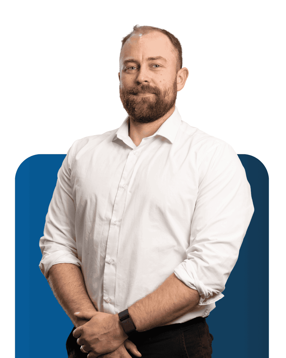 Professional team member at LATUS Group, smiling confidently.