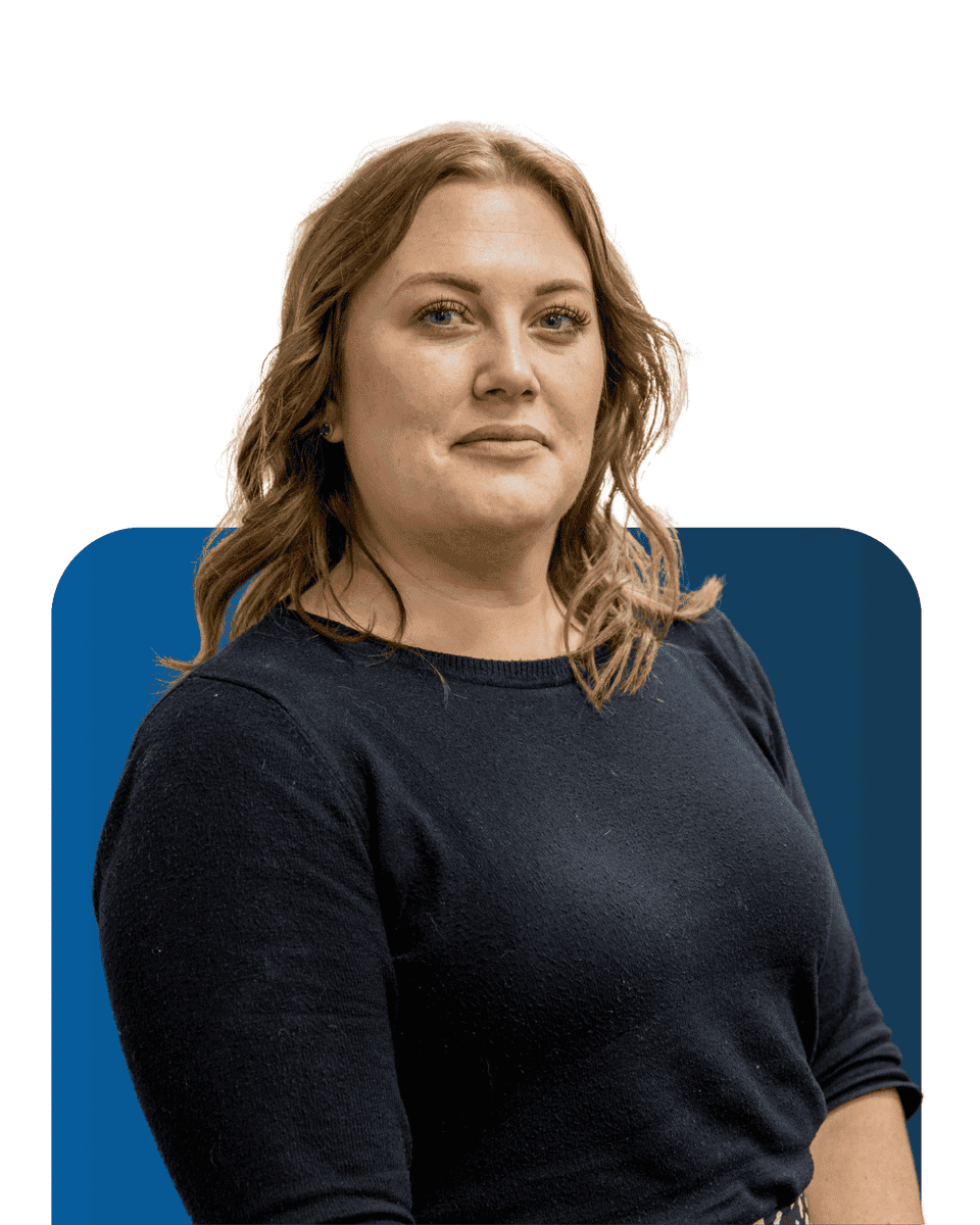 Professional woman from the LATUS Group team in a corporate portrait.