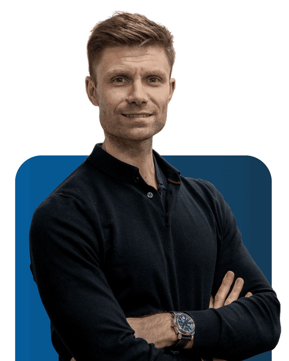 Professional team member from LATUS Group with confident expression.