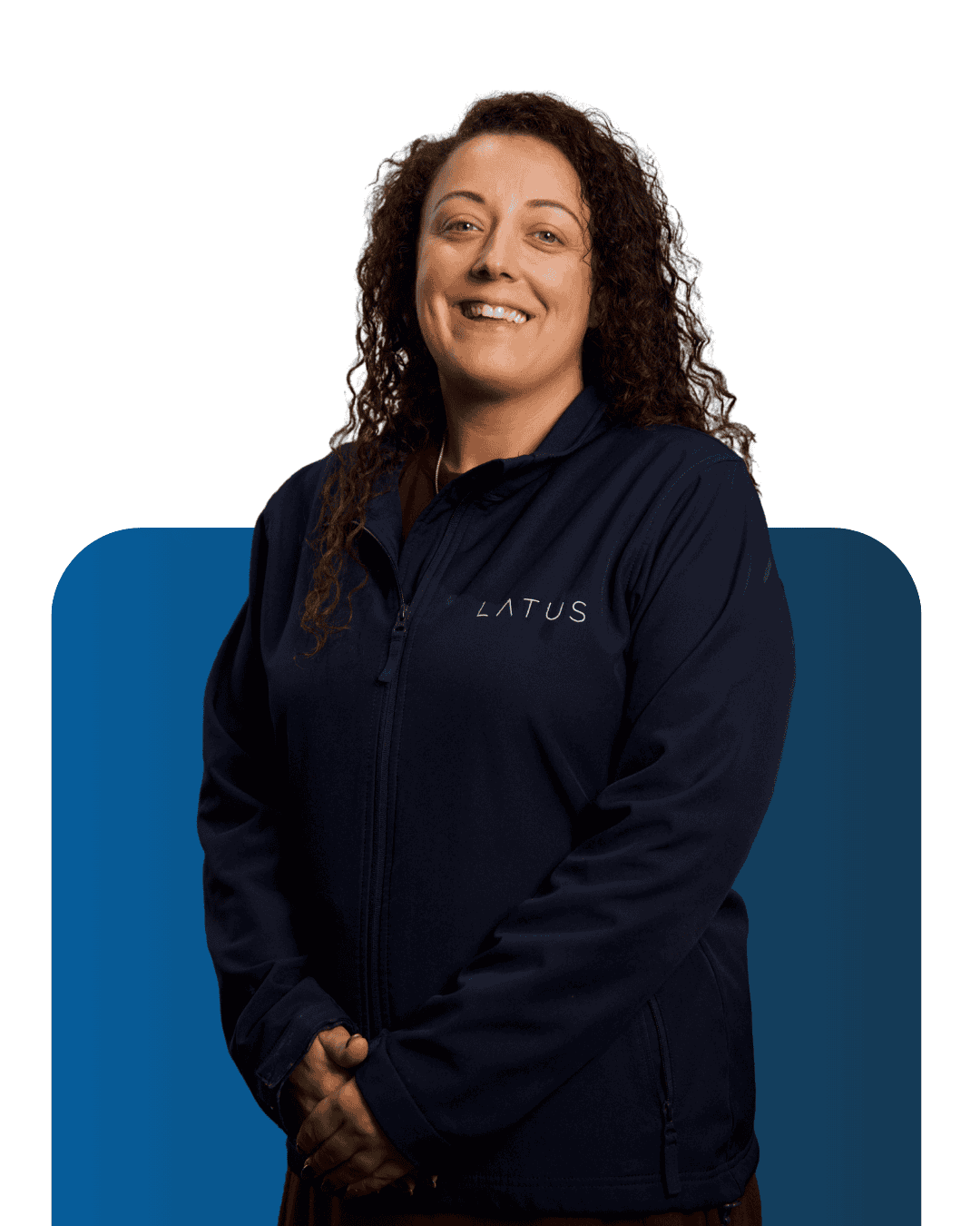 LATUS Group team member smiling in navy jacket, meet the team.