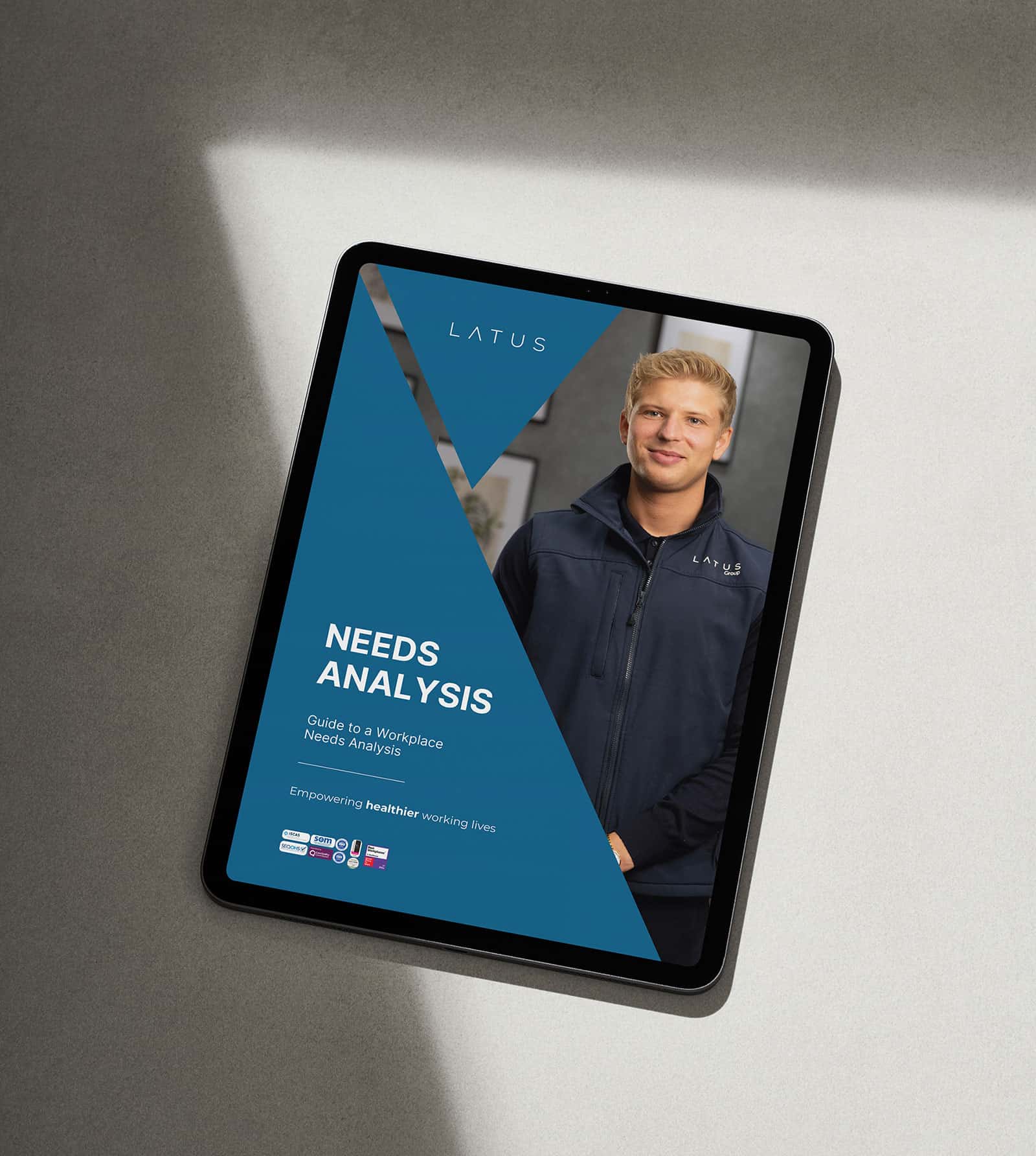 Workplace needs analysis guide on tablet with LATUS branding.
