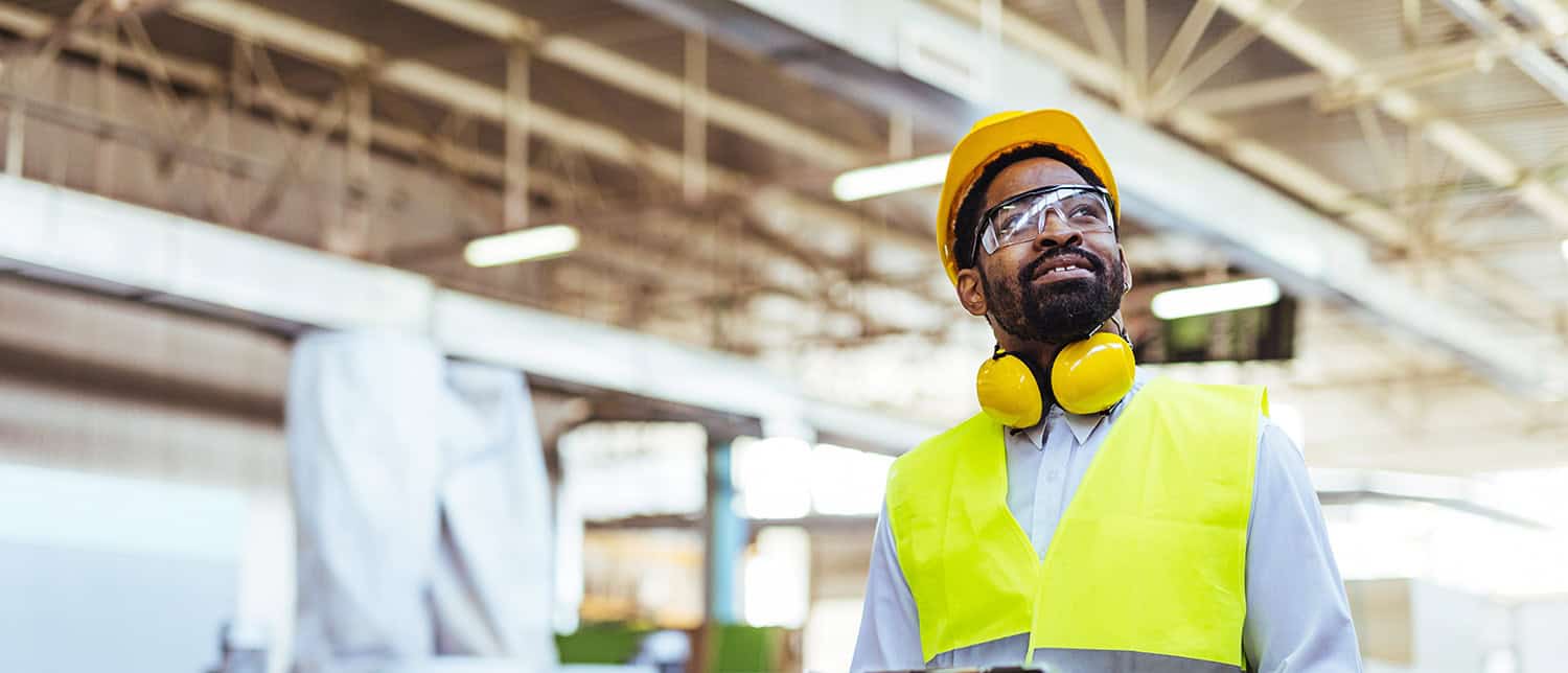 Construction worker during safety training and toolbox talks at LATUS Group site.